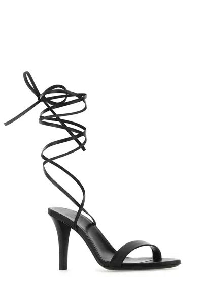 The Row Black Leather Sandals