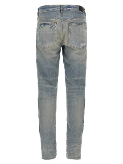 Amiri '3d Bones' Light Blue Jeans With 3d Detail On The Side And Logo Lettering On The Rear
