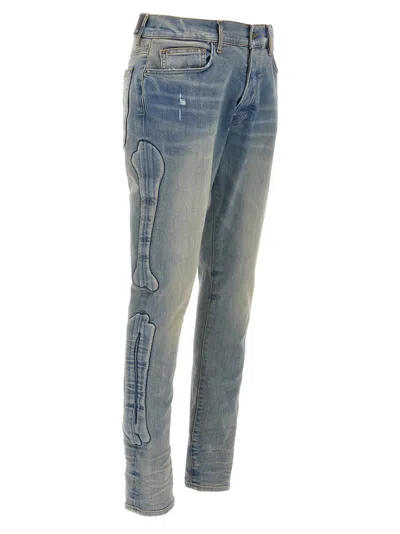 Amiri '3d Bones' Light Blue Jeans With 3d Detail On The Side And Logo Lettering On The Rear
