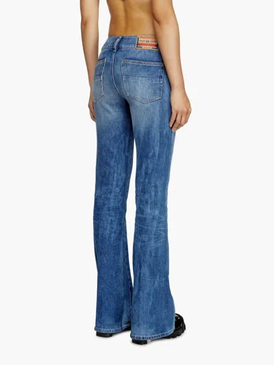 Diesel D-hush Partially Organic Cotton Flared Jeans With Back Logo Patch In Blue