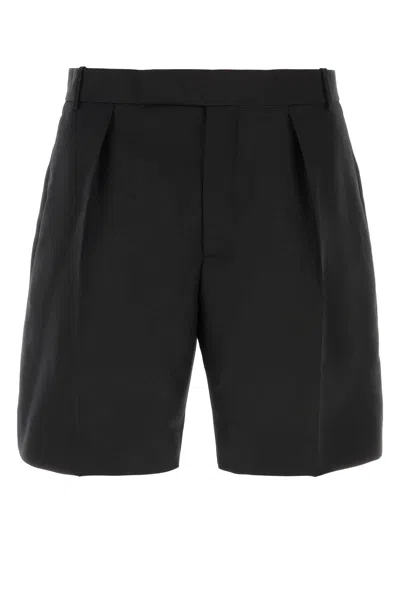 Alexander Mcqueen 4-pocketed Wide Leg Cotton Shorts In Black