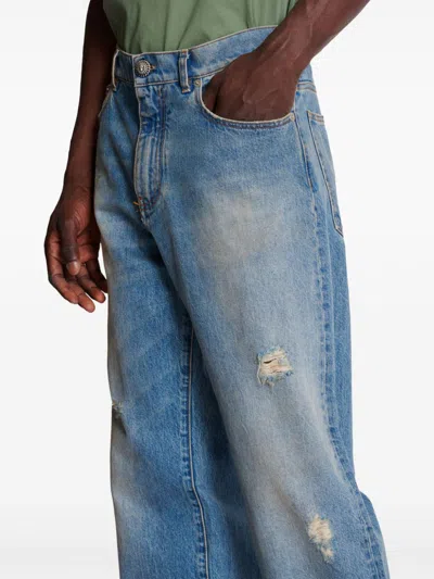 Balmain Distressed And Ripped Blue Jeans