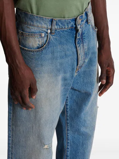 Balmain Distressed And Ripped Blue Jeans