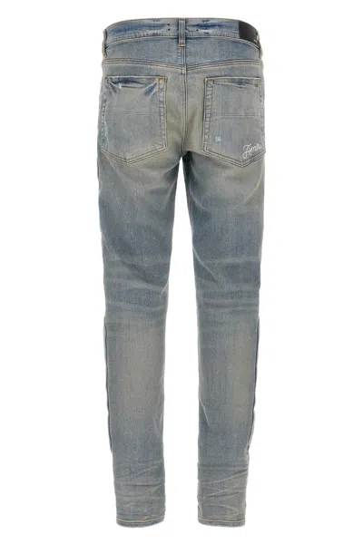 Amiri '3d Bones' Light Blue Jeans With 3d Detail On The Side And Logo Lettering On The Rear In Blue