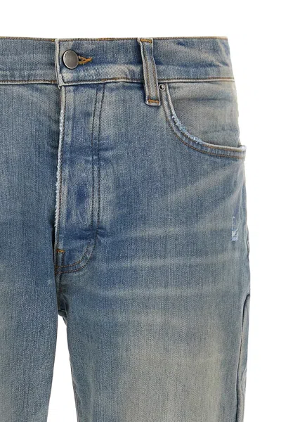 Amiri '3d Bones' Light Blue Jeans With 3d Detail On The Side And Logo Lettering On The Rear In Blue