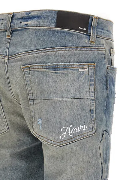 Amiri '3d Bones' Light Blue Jeans With 3d Detail On The Side And Logo Lettering On The Rear In Blue