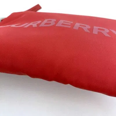 Pre-owned Burberry Red Color Nylon Rubber Clutch Bag ()