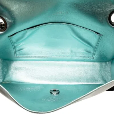 Pre-owned Chanel Black Metallic Blue Vinyl Shoulder Bag () In Black, Metallic Blue