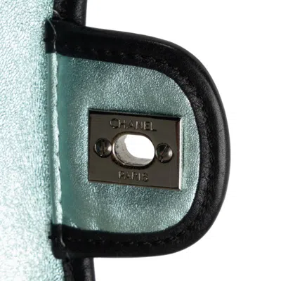 Pre-owned Chanel Black Metallic Blue Vinyl Shoulder Bag () In Black, Metallic Blue