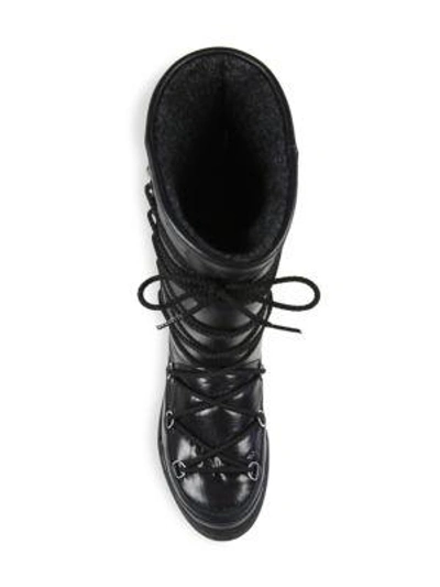 Shop Moncler New Laetitia Lace-up Moon Boots In Black