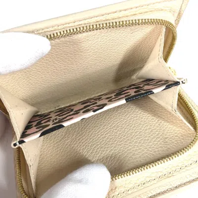 Pre-owned Louis Vuitton Beige Other Wallet (bi-fold) ()