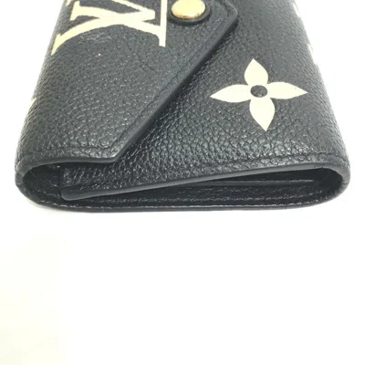 Pre-owned Louis Vuitton Black Other Wallet (tri-fold) ()