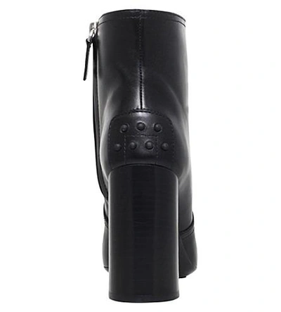 Shop Tod's Gomma Tronchetto Leather Ankle Boots In Black