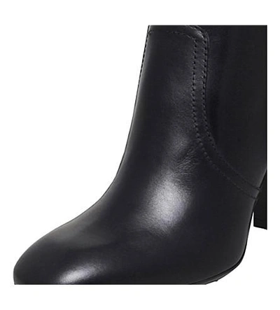 Shop Tod's Gomma Tronchetto Leather Ankle Boots In Black