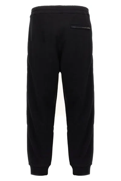 Alexander Mcqueen Mcqueen Side Band Joggers In Black