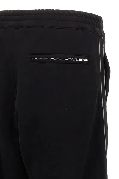 Alexander Mcqueen Mcqueen Side Band Joggers In Black