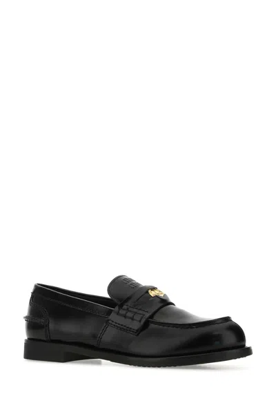 Miu Miu Leather Penny Loafers In Black