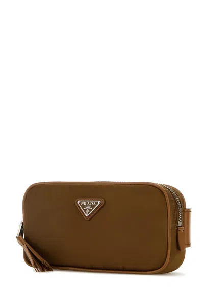 Prada Biscuit Re-nylon Belt Bag With Tassel Detail In Brown