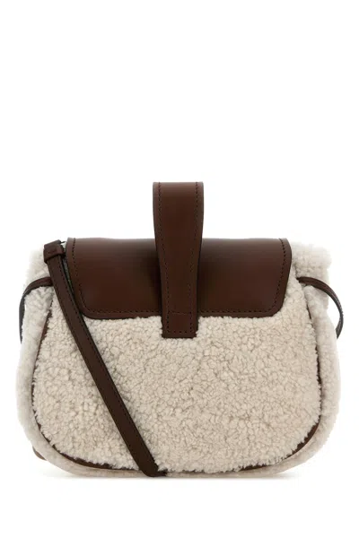 Prada Shearling Crossbody Bag With Tassel And Top Handle