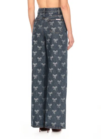 Self-portrait Blue Jeans With All-over Rhinestoned Bow Embellishments In Denim Woman In Blue