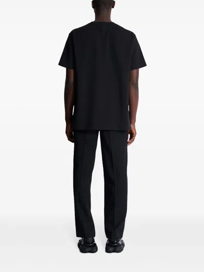 Balmain Black Crewneck T-shirt With Logo Print On The Front In Cotton Man
