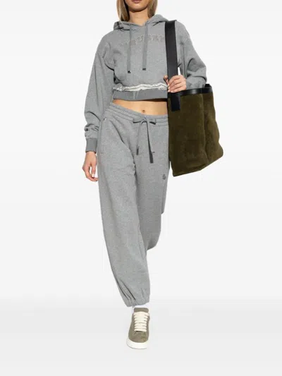 Alexander Mcqueen Logo Embroidered Hooded Sweatshirt In Grey