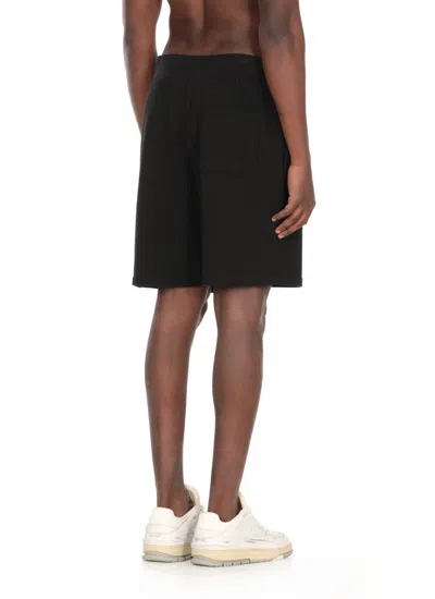 Moschino Logo Sweatpants Shorts In Black