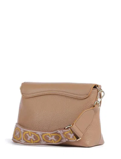 Coccinelle Bags.. In Beige