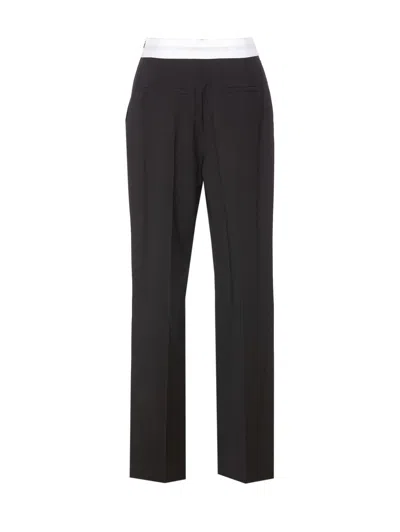 Alexander Wang Flared High Waisted Trousers With Side Pockets In Black
