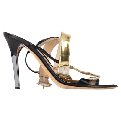Jimmy Choo T-strap Heel Sandals In Black And Gold Leather In Black