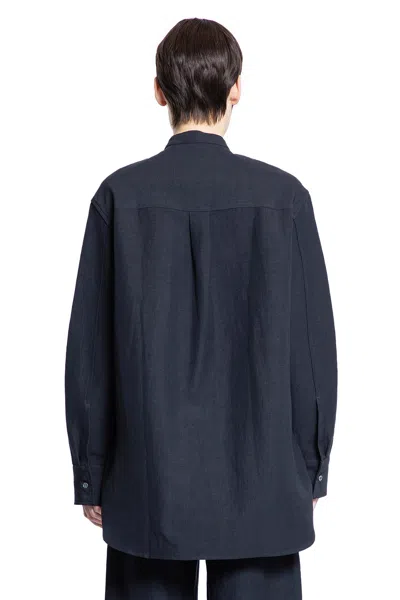 Studio Nicholson Woman Blue Shirts In Blue