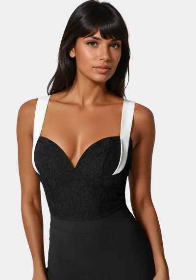 Bebe Lace Insert Flared Jumpsuit In Black,white Alyssum