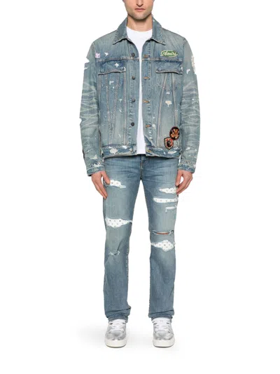 Amiri Vintage Pegasus Embellished Distressed Paint-splattered Denim Trucker Jacket In Blue