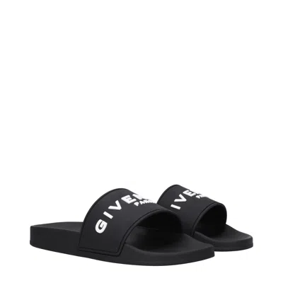 Givenchy Black Logo Embossed Slides In Black