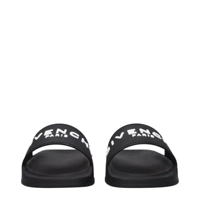 Givenchy Black Logo Embossed Slides In Black