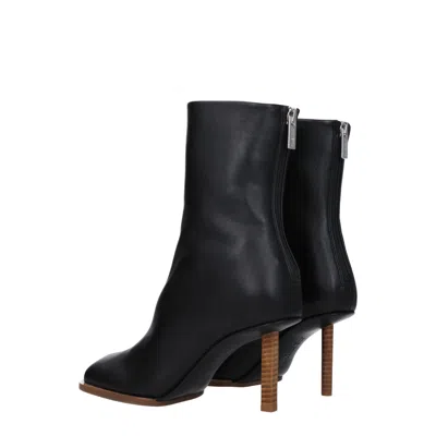 Jacquemus Black Asymmetrical Ankle Boots