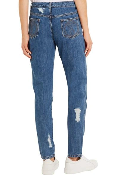 Shop Moschino Distressed Mid-rise Slim-leg Jeans