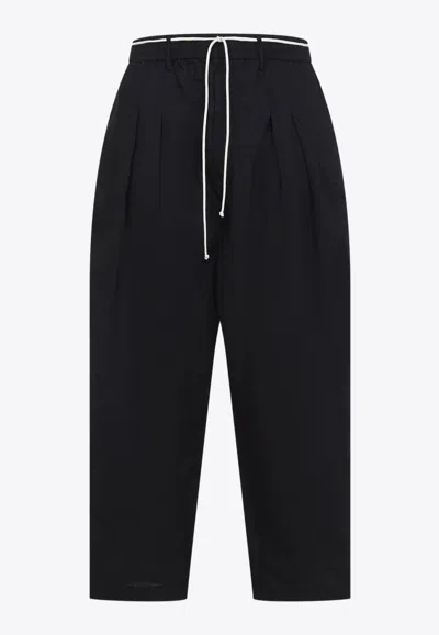 Mordecai Black Virgin Wool Pleated Drawstring Structured Wool Trousers In Black