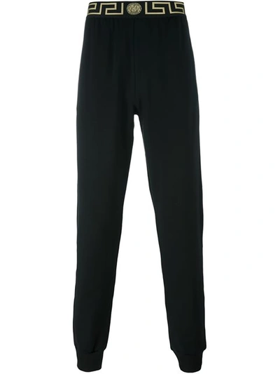 Versace 'greca' Waistband Track Pants In Black