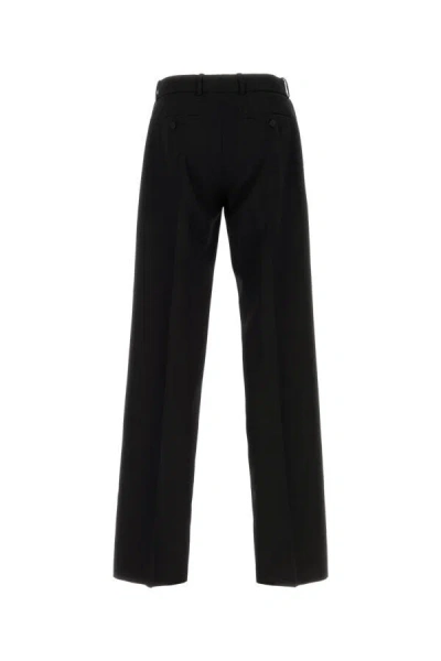 Alexander Mcqueen Wide Leg Wool Trousers With Front And Back Pockets In Black