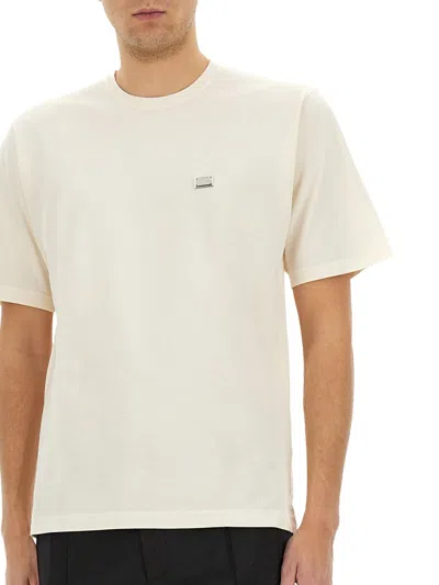 Dolce & Gabbana White T-shirt With Crew Neck And Applied Logo Plate On The Chest In Cotton Man In Cream