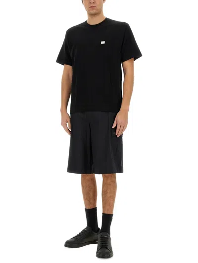 Dolce & Gabbana Cotton T-shirt With Metal Plaque Featuring Front Logo In Black