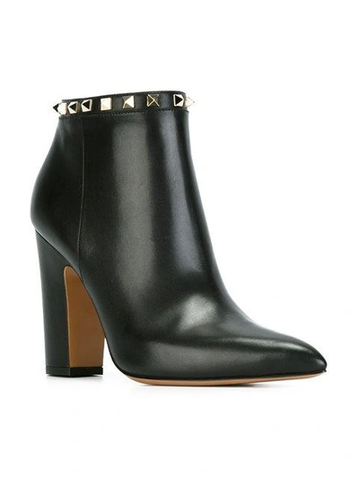 Shop Gucci Rockstud Ankle Boots In Black