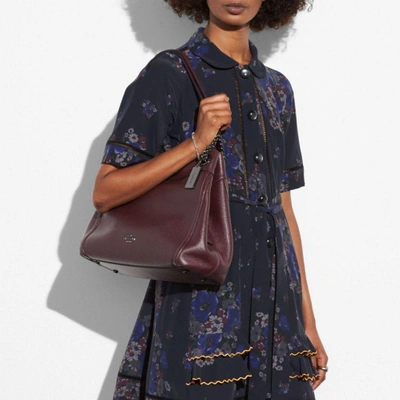 Shop Coach Turnlock Edie Shoulder Bag In : Light Gold/oxblood