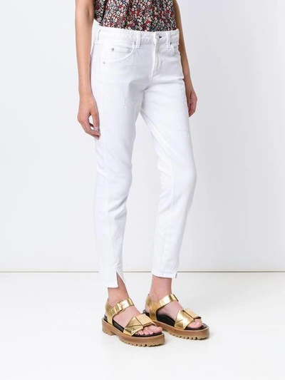 Shop Amo Cropped Twisted Jeans