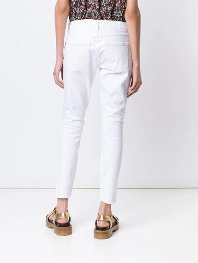Shop Amo Cropped Twisted Jeans