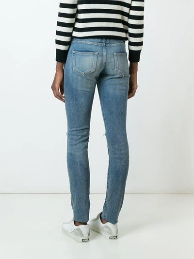 Shop Saint Laurent Distressed Skinny Fit Jeans In Blue