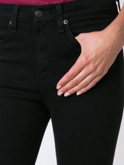 Shop Rag & Bone Flared Cropped Jeans In Black