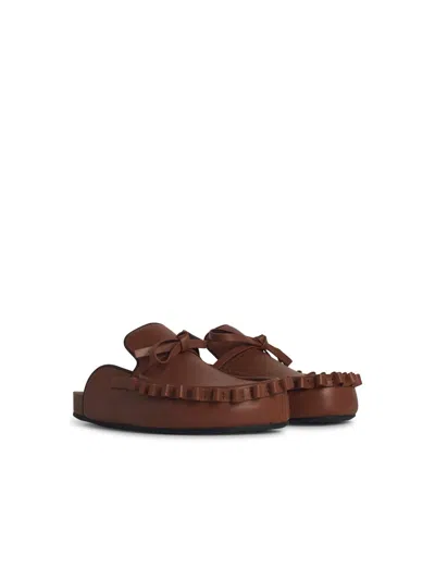 Jw Anderson Leather Slippers With Ruffle Trim And Bow In Brown