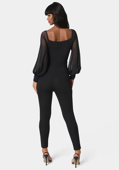 Bebe Printed Mesh Off Shoulder Catsuit In Black